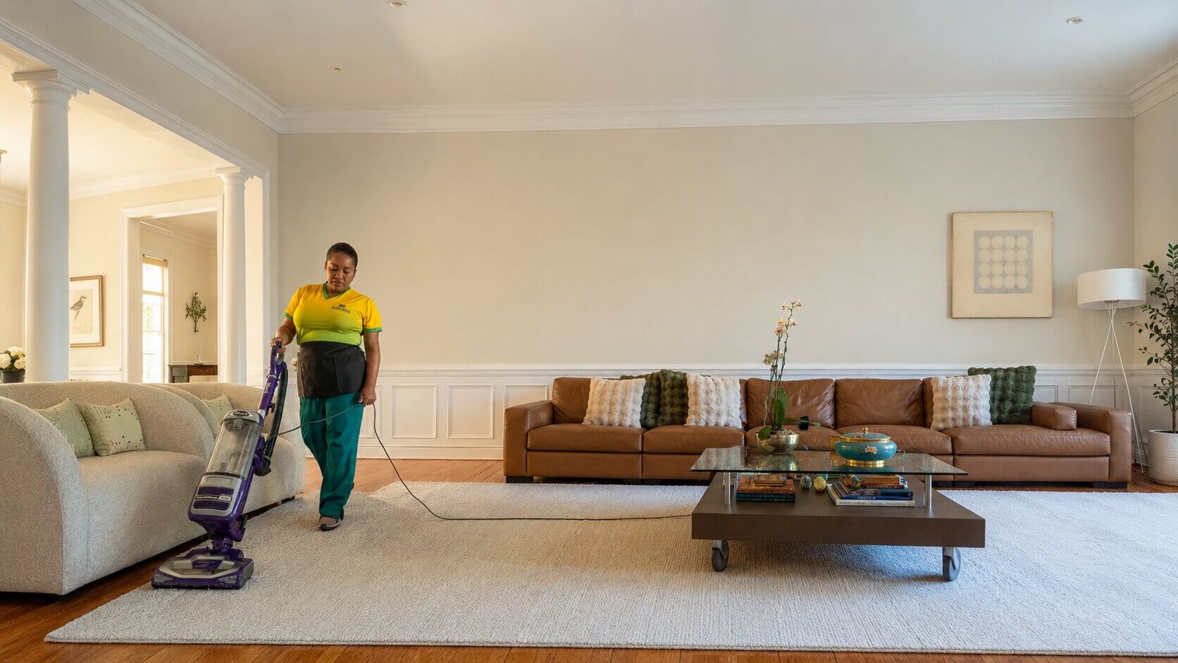 A cleaner from Andreia's Brazilian House Cleaning cleaning a home in the Triangle Area, NC